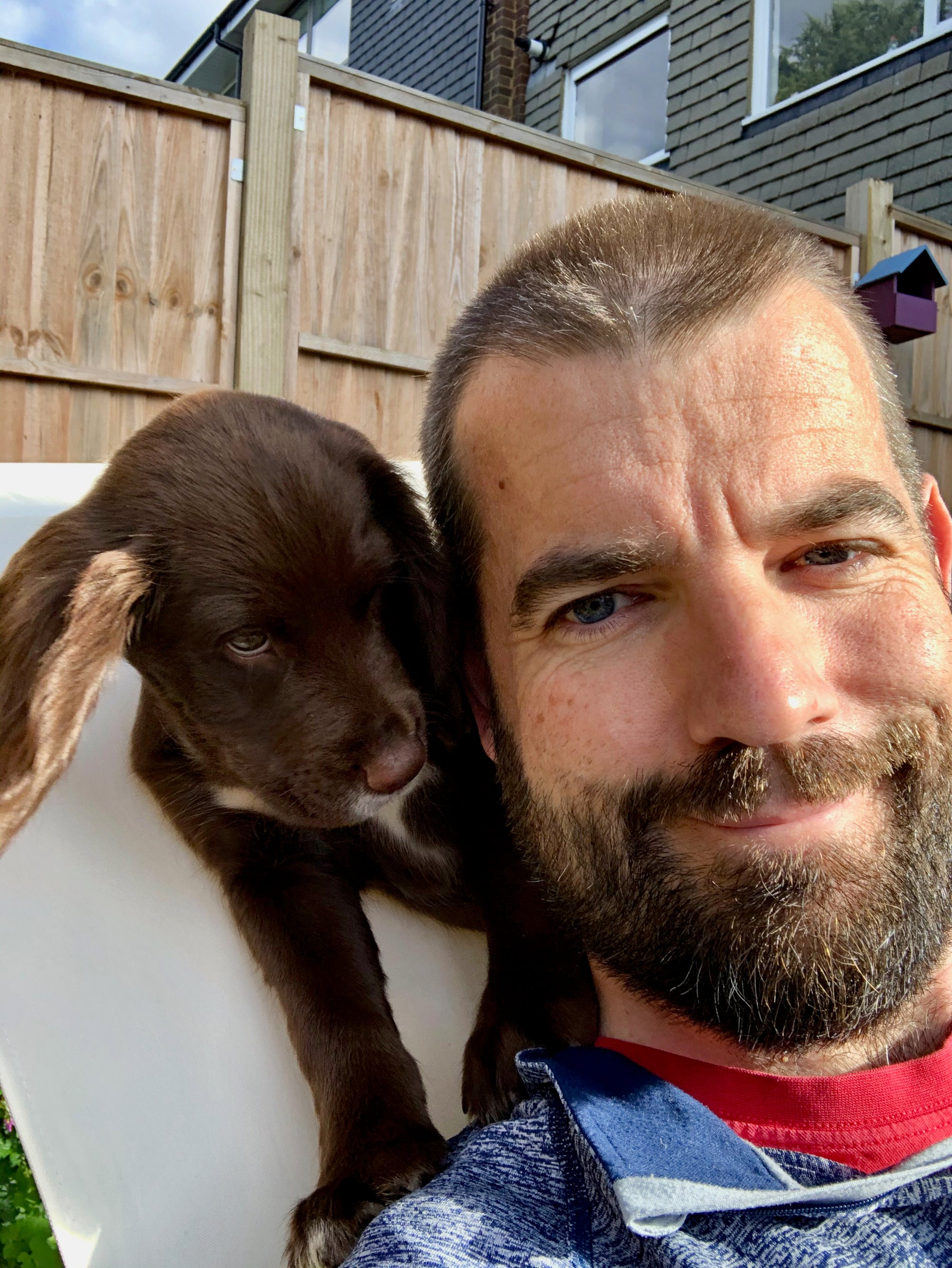 Pet food founder with his cocker spaniel puppy